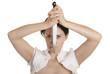 Young woman holds knife in face