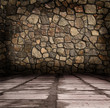 stone wall by a sidewalk