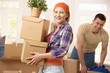 Photo : Happy couple moving house