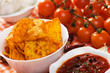 Tortilla chips with hot chili sauce