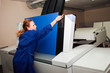a woman works on a printing factory, Computer to Plate