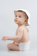 Infant in hat.