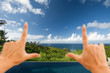 Hands Framing Breathtaking Hawaiian Ocean View Deck and Pool Hands Framing Breathtaking Hawaiian Ocean View Deck and Pool