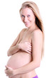 undressed pregnant female holding her breasts undressed pregnant female holding her breasts