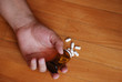 pills out of the bottle , medicine concept, suicide concept