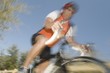 Male cyclist, blurred motion
