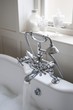 Shower fitting with running tap, London
