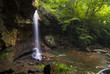 Secluded and peaceful waterfall in a forest