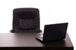 Laptop in a office desk, on white background