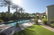 Swimming pool in landscaped grounds