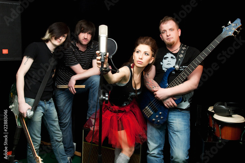 Photo: Group of rock musicians with musical instruments Group of rock musicians with musical instruments