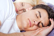 Couple sleeping late
