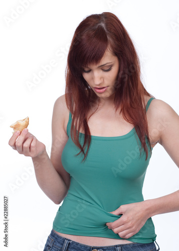 Photo: Young woman worried about her weight Young woman worried about her weight