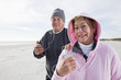 Senior couple listening to music on MP3 player