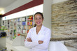 portrait of a female pharmacist at pharmacy