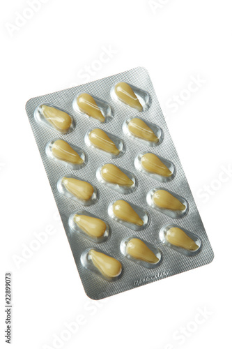 Photo: tablets and vitamins isolated on white tablets and vitamins isolated on white