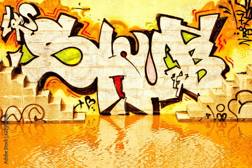 Photo: Graffiti and orange water Graffiti and orange water