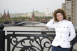 Russian woman and kremlin
