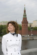 Russian woman and kremlin close up