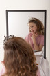 Photo: little girl playing make-up and fairy princess little girl playing make-up and fairy princess