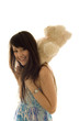Prettty woman with a teddy on the neck