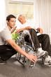 Helping a disabled man to stand up