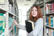 young asian girl in library young asian girl in library