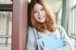 young asian girl in library young asian girl in library