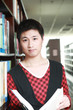 asian boy studying in library asian boy studying in library