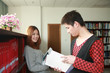 boy and girl studying in library boy and girl studying in library