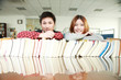 asian boy and girl in library asian boy and girl in library