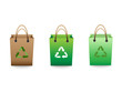 Green sale shopping bags with recycle sign