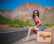 Beautiful woman hitching a ride to Hollywood