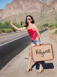 Beautiful woman hitching a ride to Hollywood