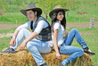 couple on a hay bale
