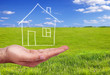 hand holding a house hand holding a house