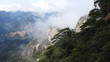 san 33 clouds crossing over mountain
