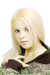 Young blonde woman in sweater