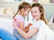 Portrait of happy woman with daughter