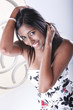 Young hindu brunette at contemporary lounge