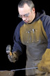 blacksmith bending a wrought iron rail blacksmith bending a wrought iron rail