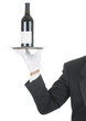 Butler with Wine Bottle on Tray Butler with Wine Bottle on Tray