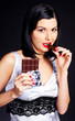 girl eating chocolate girl eating chocolate