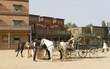 Cowboys watering horses