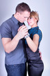 Elegant and happy romantic dancing couple