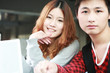 couple of asian using laptop couple of asian using laptop