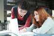 couple of asian using laptop