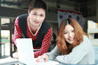 couple of asian using laptop couple of asian using laptop