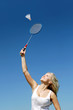 sport woman is plaing badminton