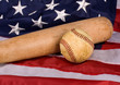 Foto: Old Baseball and Bat with American Flag Old Baseball and Bat with American Flag